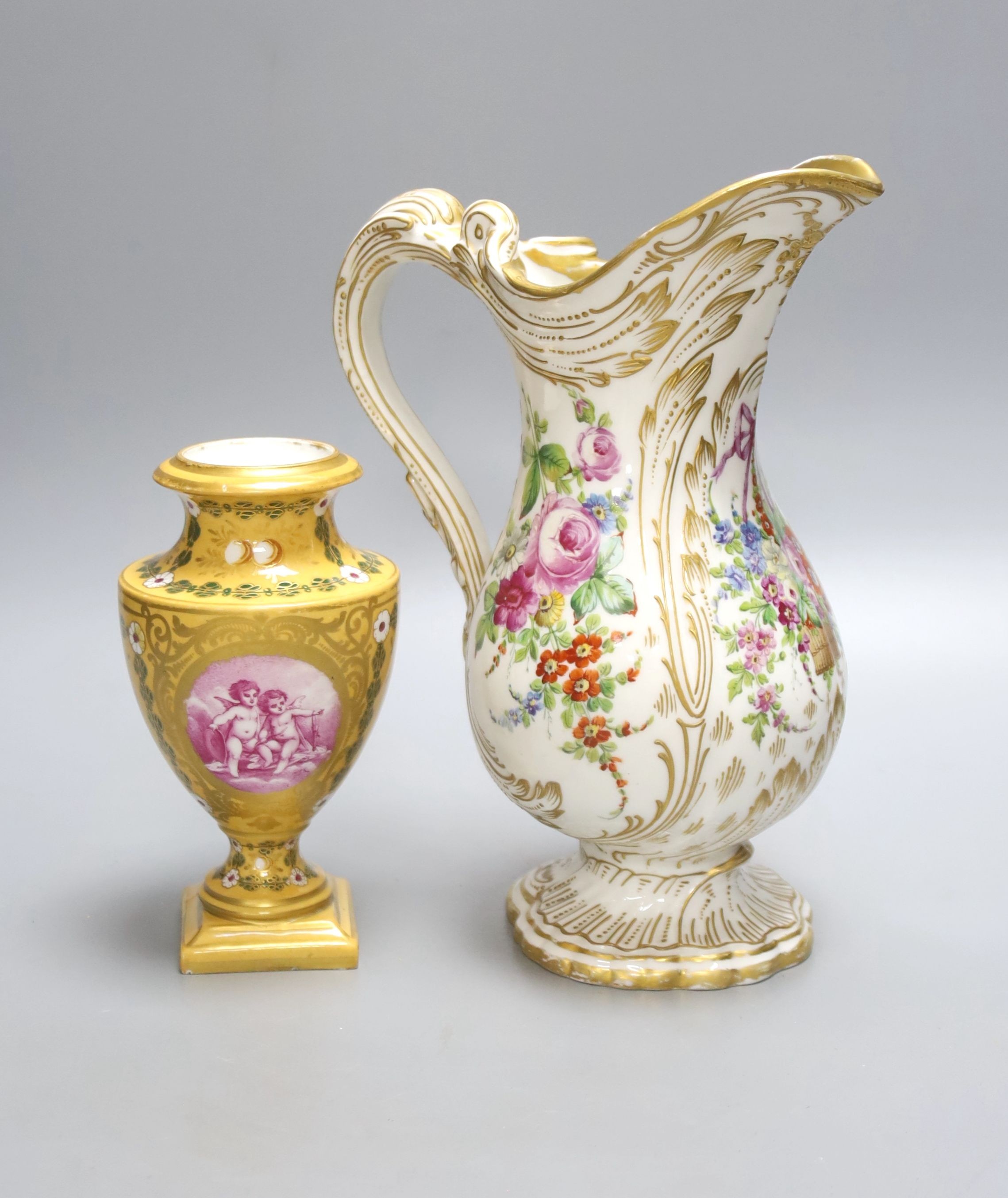 A 19th century Sevres floral and gilt painted jug and vase, tallest 24cm